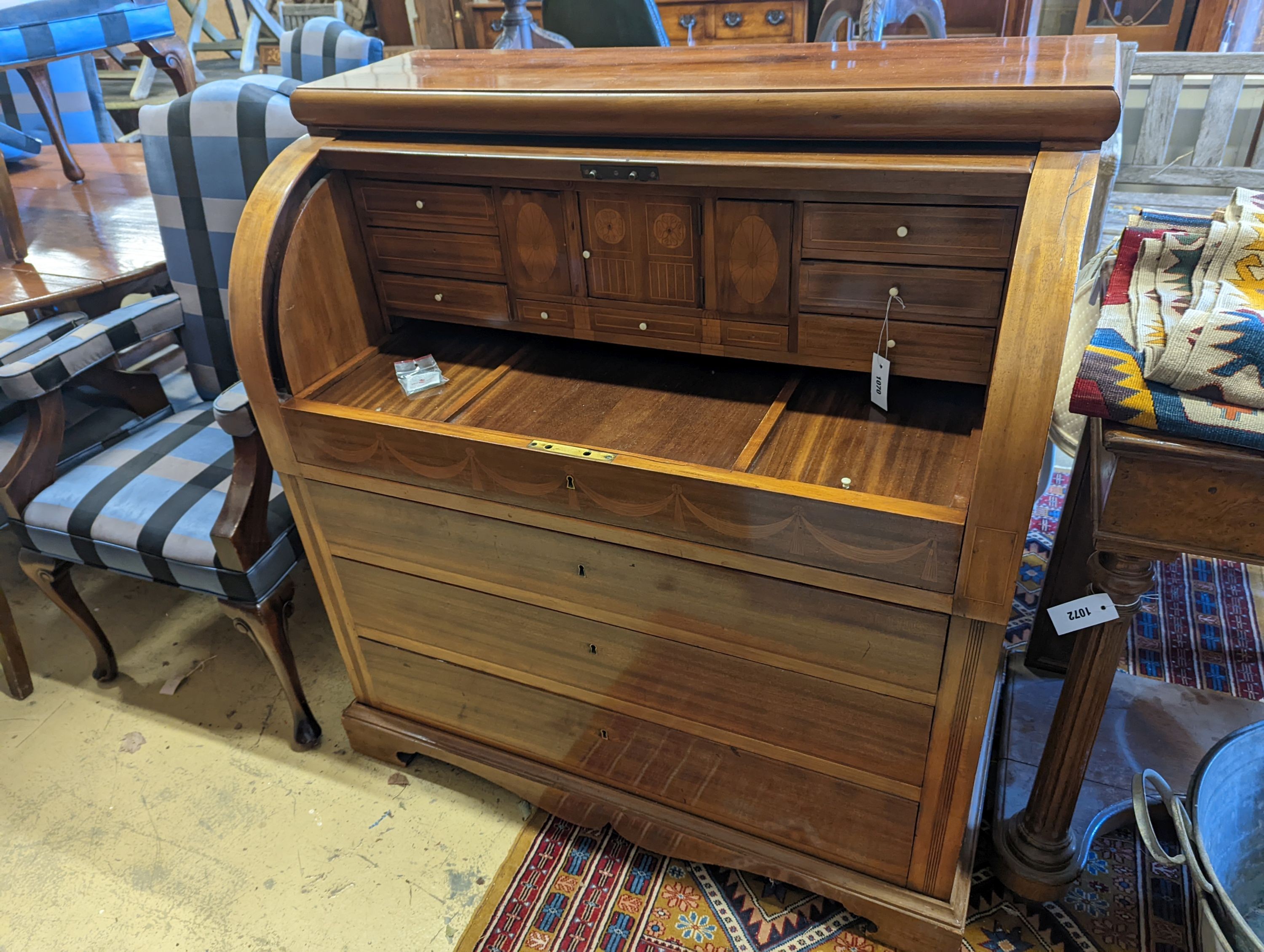 A reproduction inlaid mahogany cylinder bureau, width 110cm, depth 58cm, height 115cm